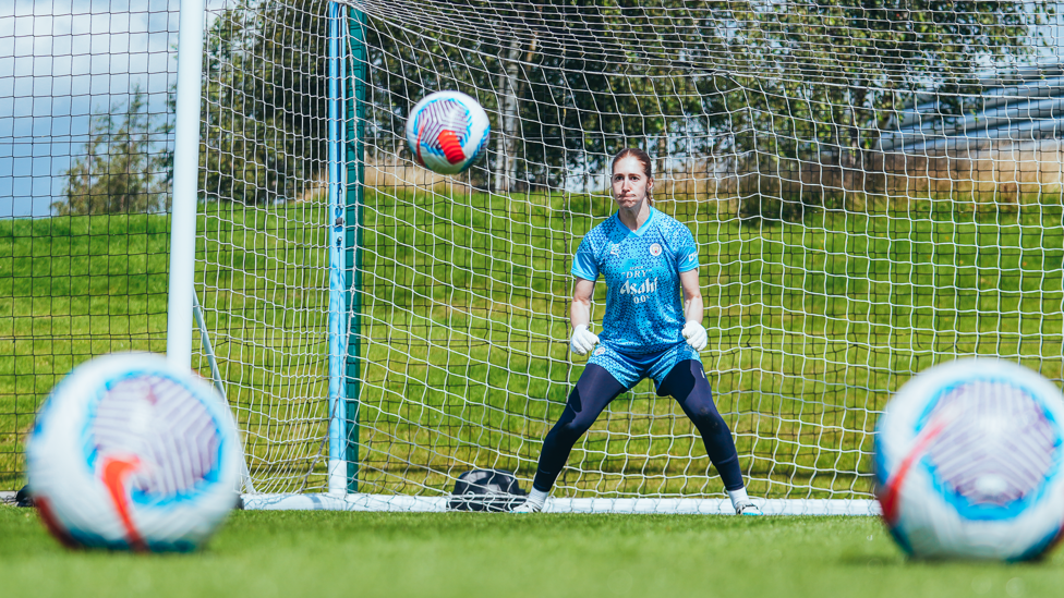 ACTION SHOT : Goalkeeper Sandy MacIver is put through her paces