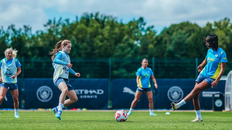 PASS AND MOVE  : Jess Park looks to intercept Leila Ouahabi's pass.