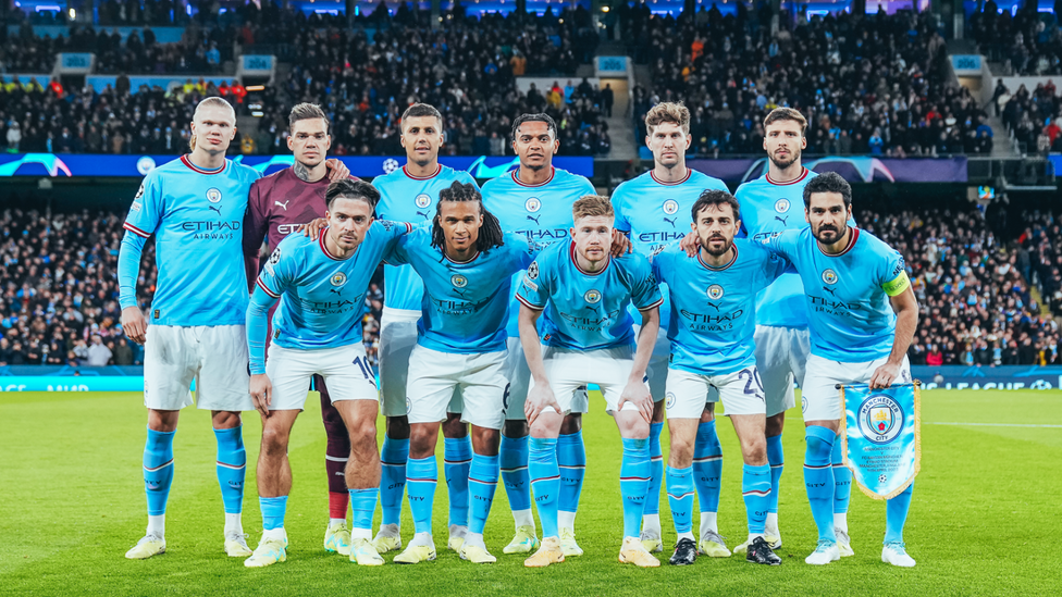 TEAM: The starting line-up have their photo taken before the match kicks off.