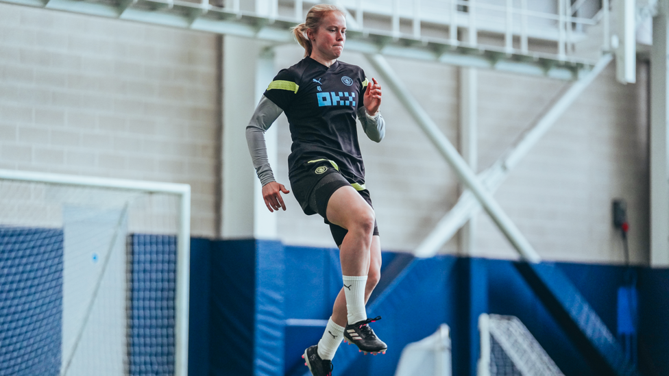 HIGH KNEES  : Julie Blakstad rises high during the session