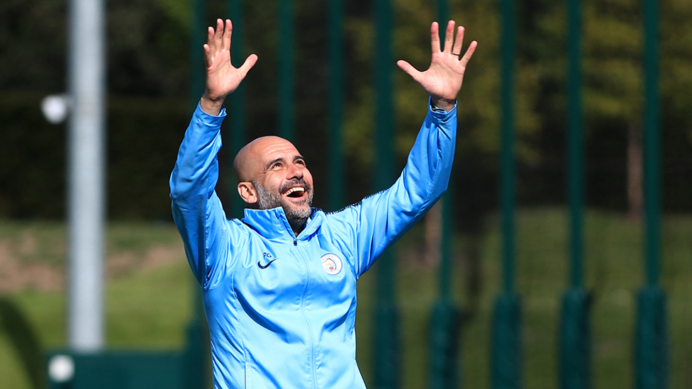  : Pep enjoys the Manchester weather!