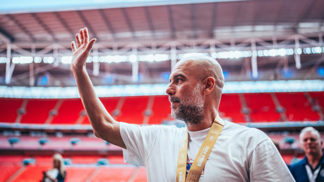 THE BOSS: Celebrates on the touchline.