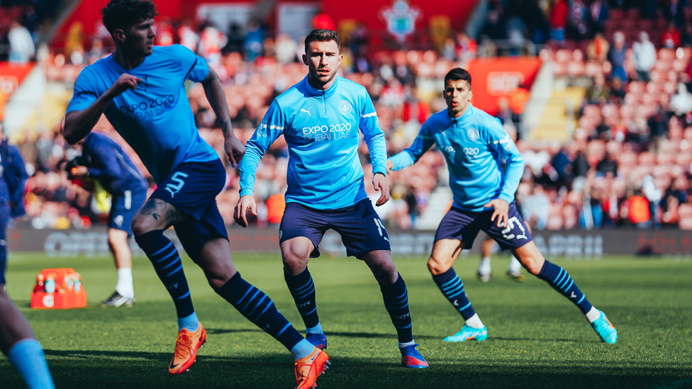 LIMBERING UP : Laporte, Stones and Cancelo getting the prep in. 