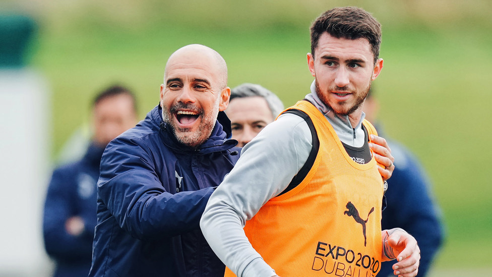 TOUCH TIGHT : The boss and Aymeric Laporte pictured during today's session