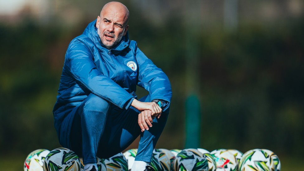 THE BOSS  : Pep Guardiola watches on.