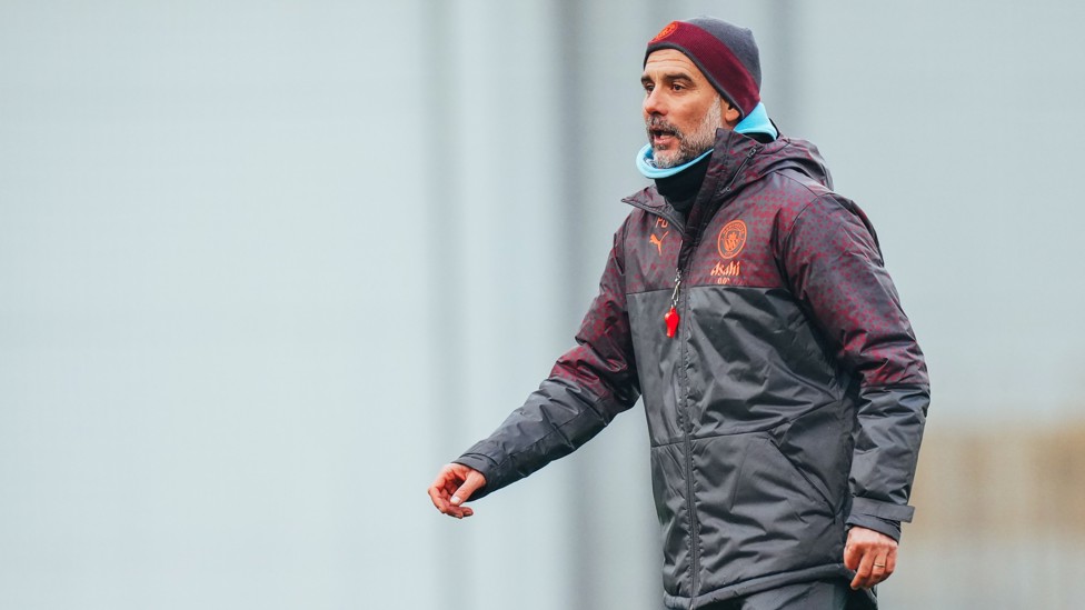 BOSSING IT : Pep Guardiola keeps an eye on training