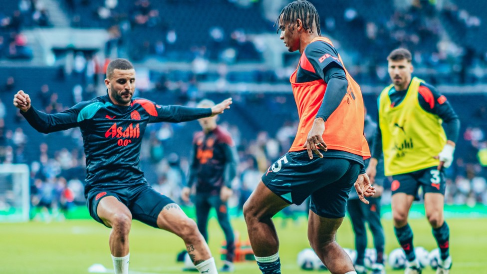 GETTING WARM : Kyle Walker contests Manuel Akanji's pass.