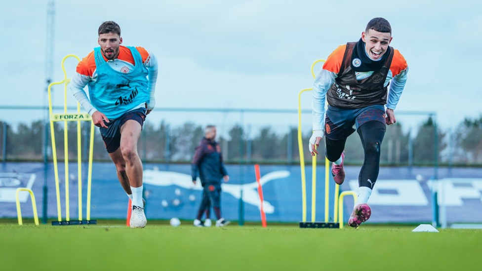 ACTION STATIONS: Ruben Dias and Phil Foden turn on the afterburners.