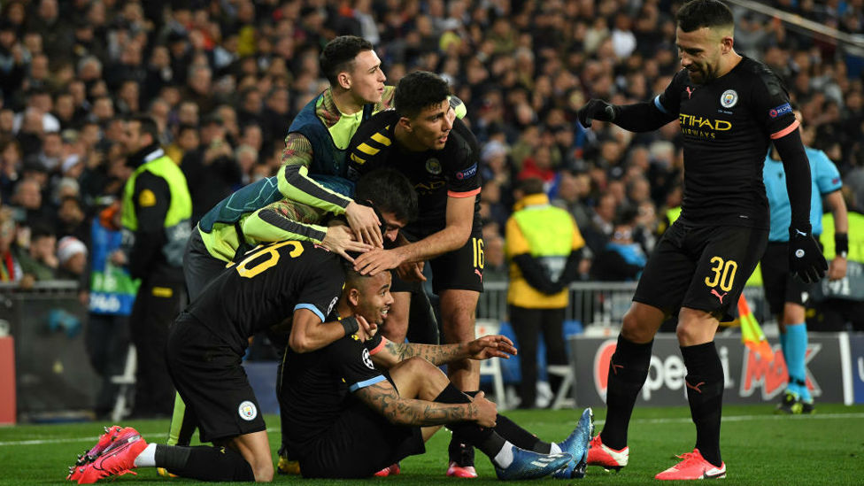 MOBBED: The team celebrate their equaliser