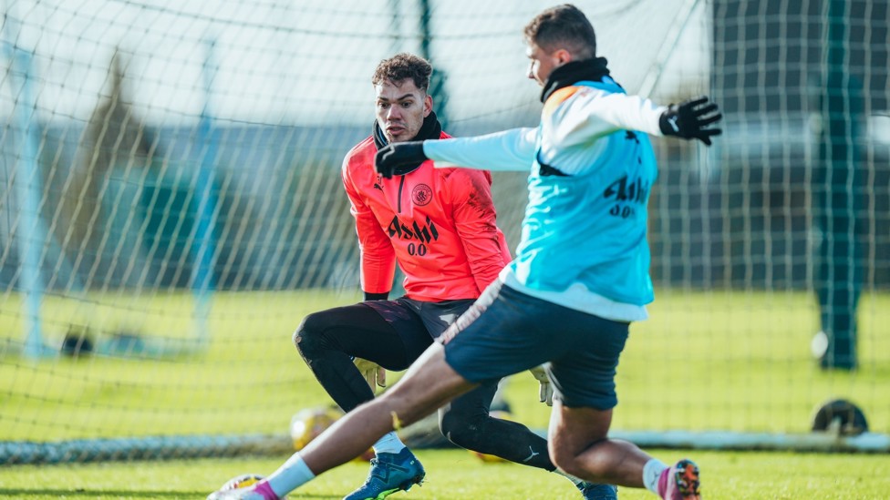 HE SHOOTS  : Rodrigo tries to get the better of Ederson. 