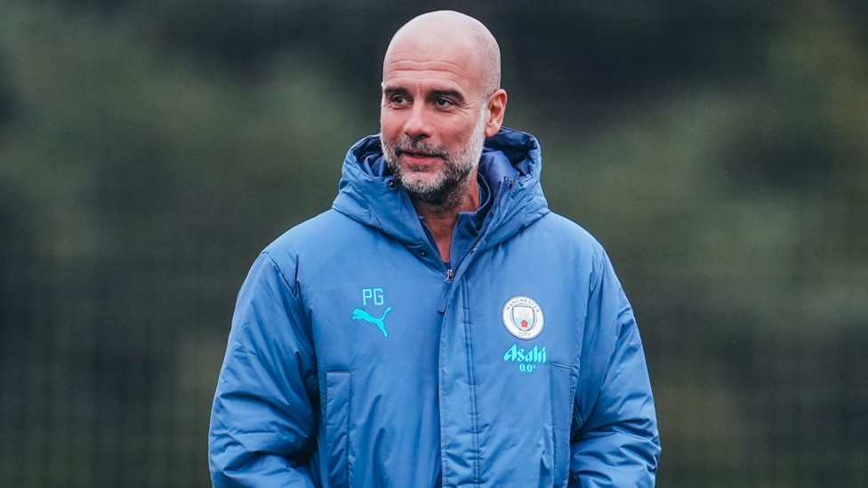 PG : Pep Guardiola oversees training. 