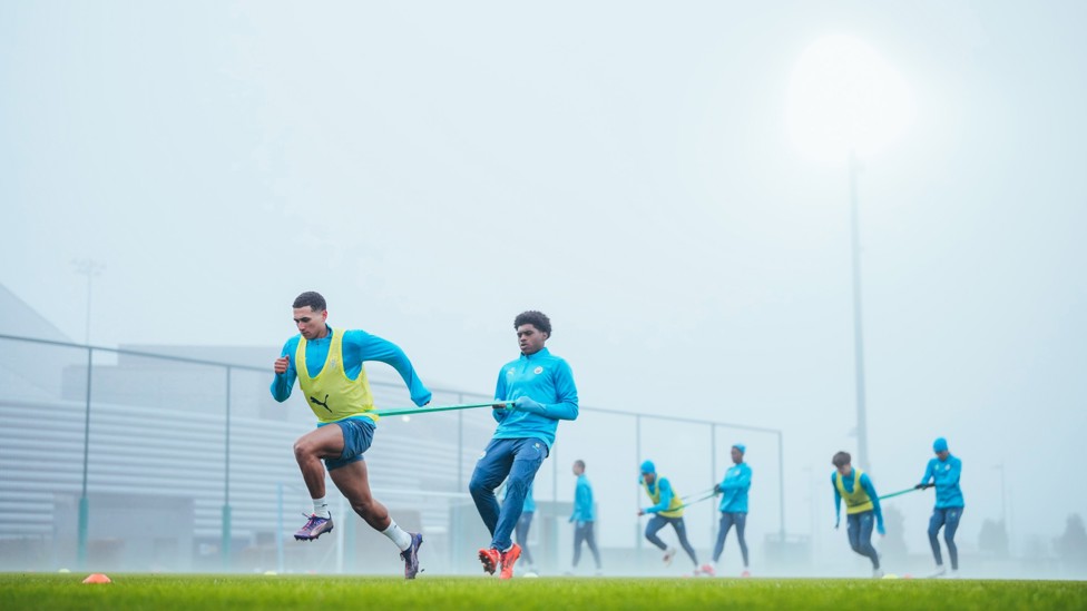 BUSRTING FORWARD : Ezra Carrington returns to training and is put to the test by Jaden Heskey.