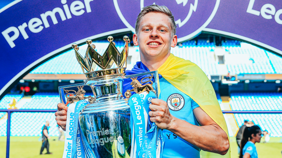 CHAMPION: Zinchenko proudly holds the Premier League trophy after our 2017/18 title success