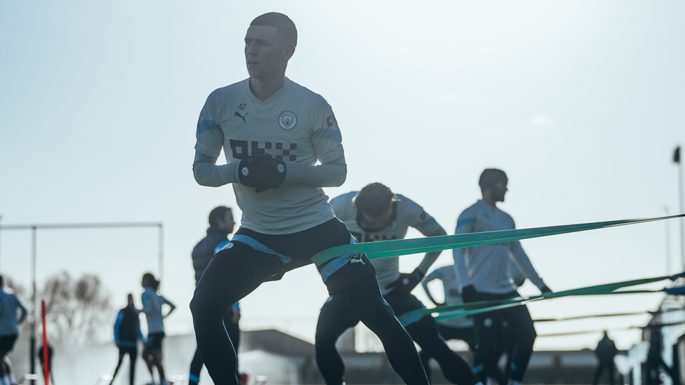 BIG STRETCH : Phil Foden limbers up at the CFA before training