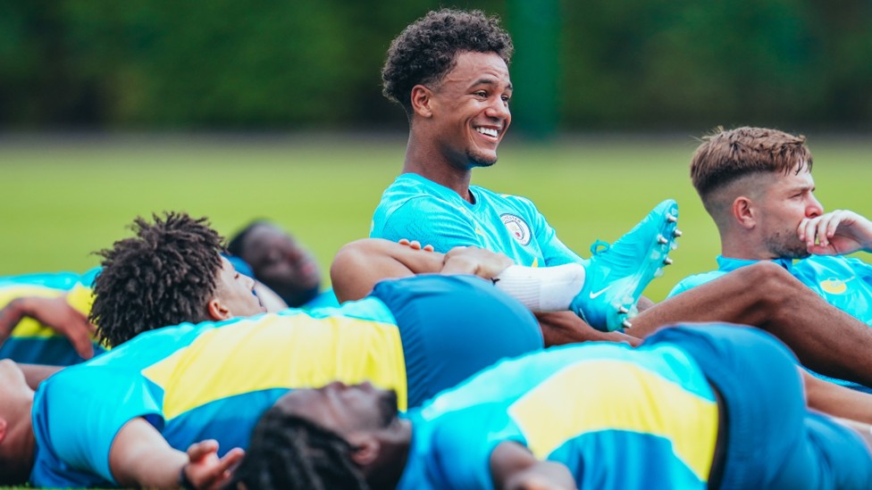 BOBB ON: Oscar Bobb was all smiles as the City players went about their work.