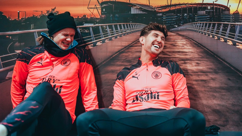 BEST BUDS : Erling Haaland and John Stones sharing a joke or two before training.