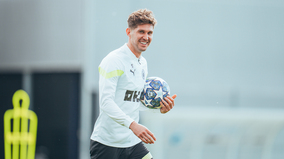 MY BALL : John Stones keeps control of the ball