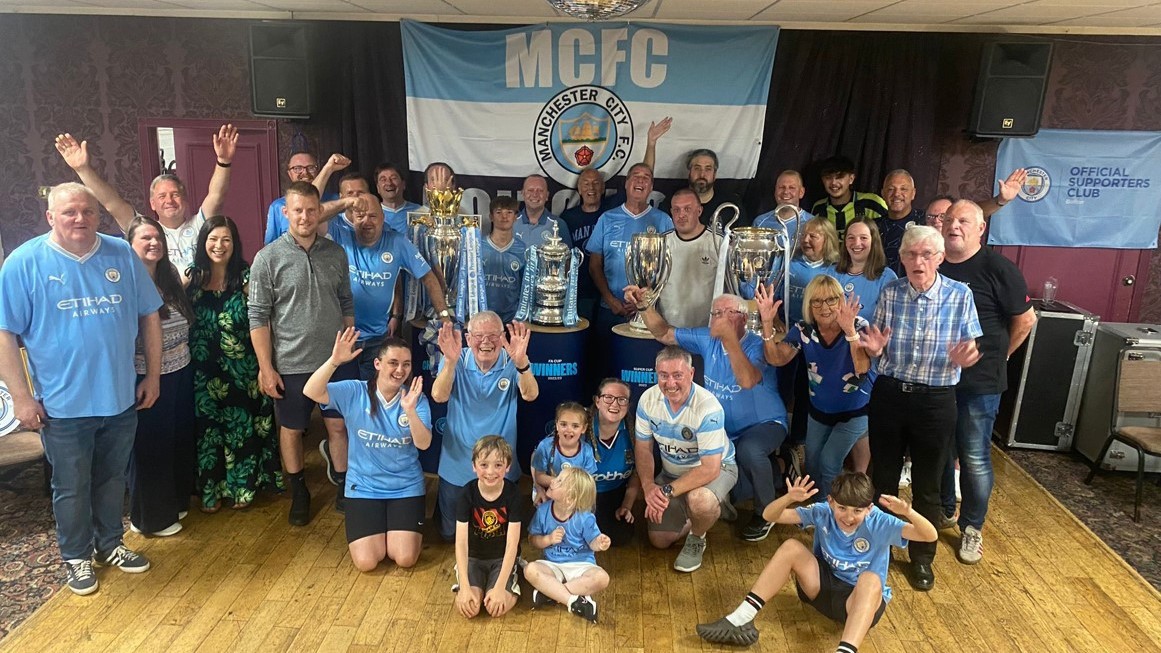 BUZZ IN BOLTON : Our OSC in Bolton enjoying seeing our Treble trophies