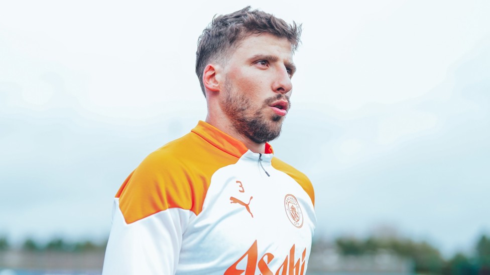 DEFENCE  : Ruben Dias makes his way onto the pitch.