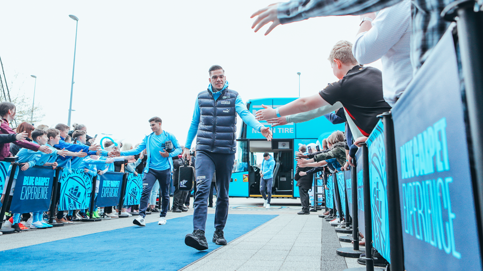 ENTER EDDY: The team step off the team coach to be greeted by our special fans.