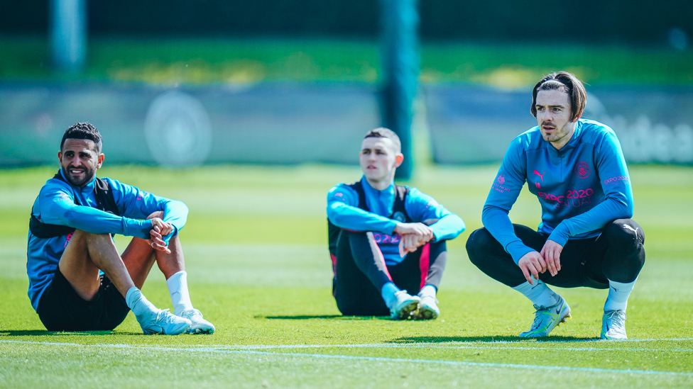 BREATHER: Riyad Mahrez, Phil Foden and Jack Grealish take a quick break