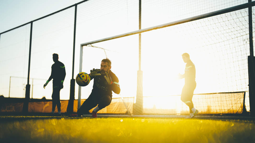 A BIG HAND: Scott Carson gets down to business