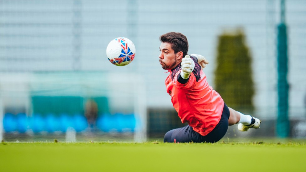 STEFAN SAVES : Stefan Ortega Moreno keeps his eyes on the ball as he parries the ball away