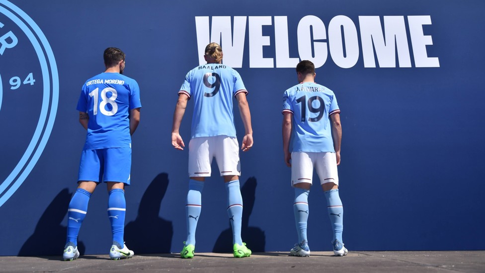 SHIRT NUMBERS : The trio show off their numbers and the 2022/23 City home kit. 