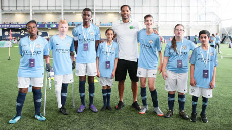 OCCASION TO REMEMBER: Joleon Lescott with youngsters at the Premier League and CITC Disability Football Festival