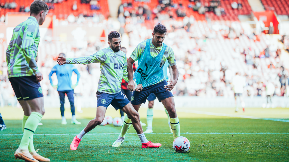 WARMING TO THE TASK: Riyad Mahrez and Rodri go through their pre-match prep.