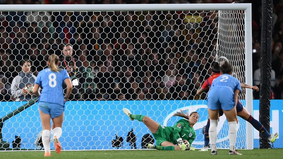 BIG SAVE! : But Mary Earps saves the penalty kick comfortably to keep England in it. 