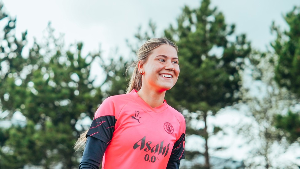 TO THE PITCH  : Poppy Pritchard makes her way onto the field.