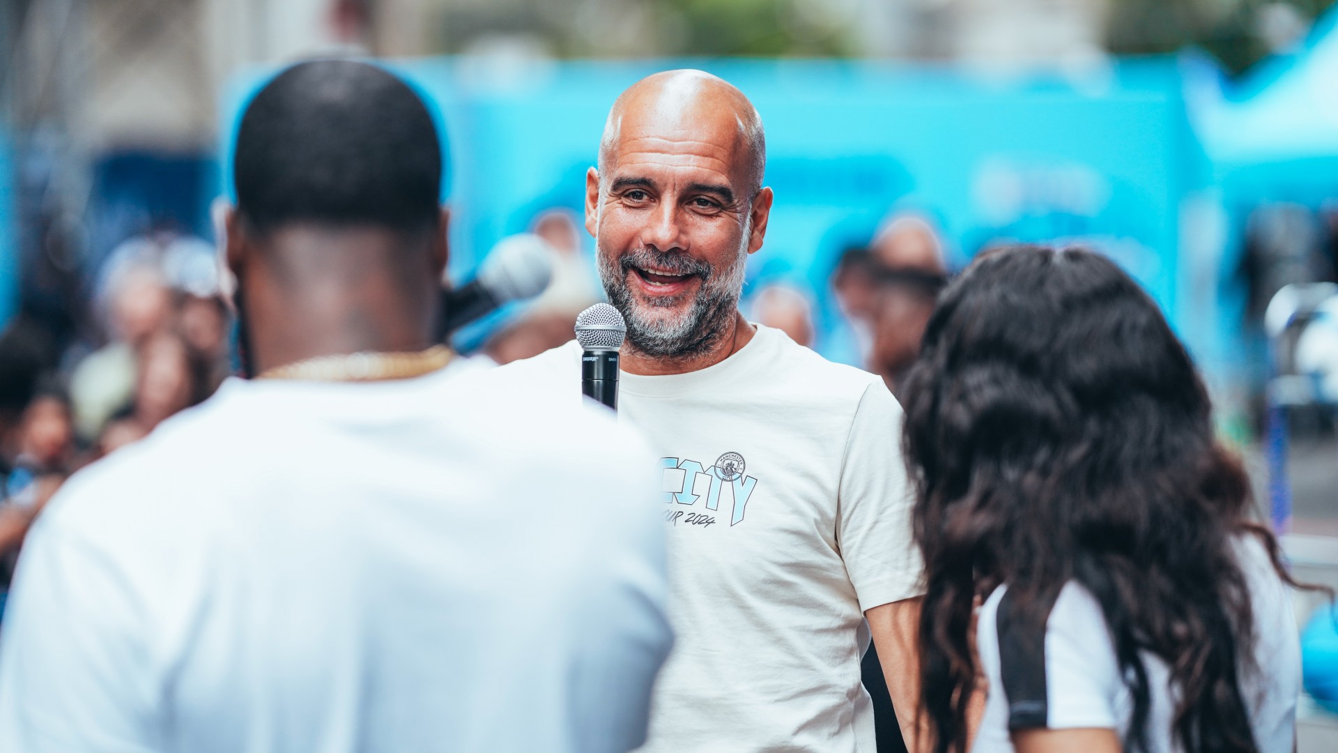 Man City star beam as he plays street basketball in New York in special outfit