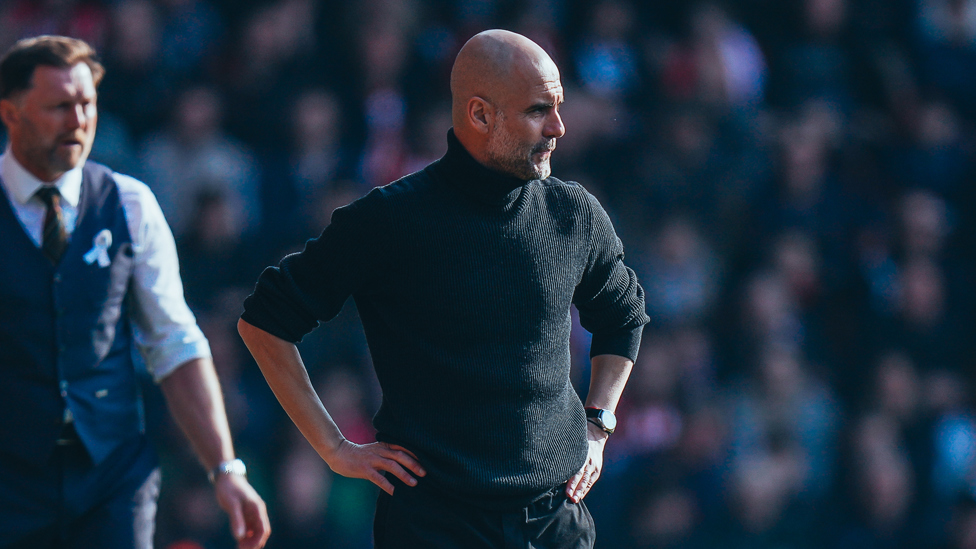 THE BOSS : Pep looks on from the sidelines