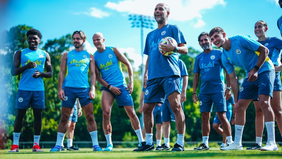 LAUGHING LEADER : Pep Guardiola and the squad having a good time on tour. 