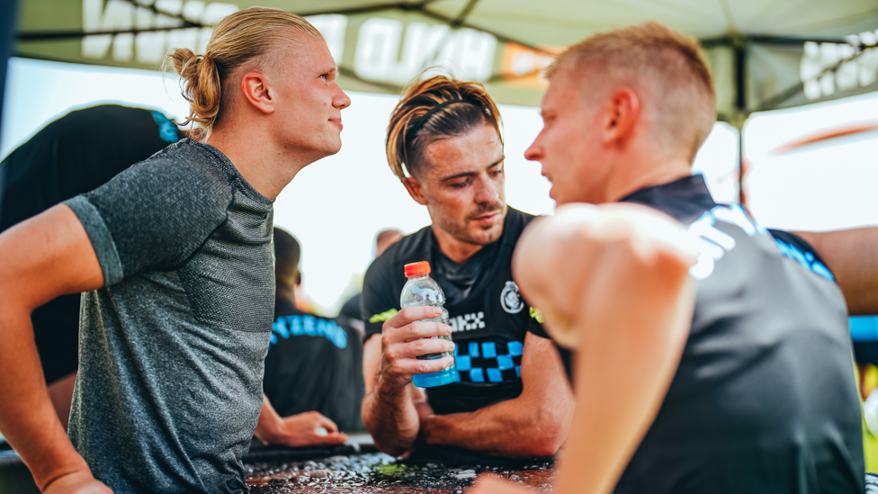 KEEPING COOL : Erling Haaland, Jack Grealish and Oleksandr Zinchenko rest up