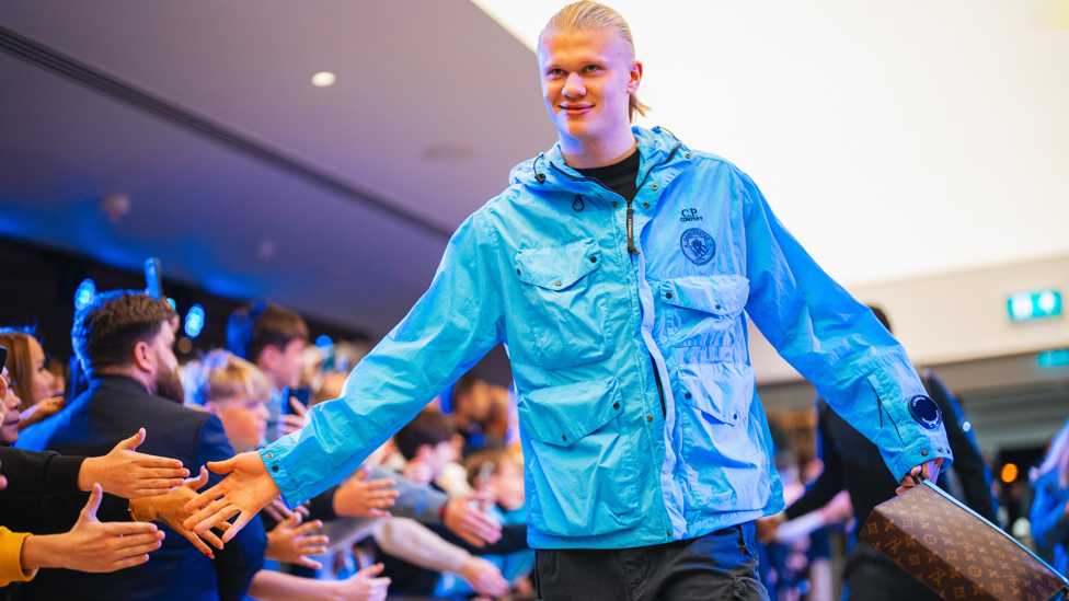 HAPPY HAALAND : Erling in good spirits when arriving at the stadium.