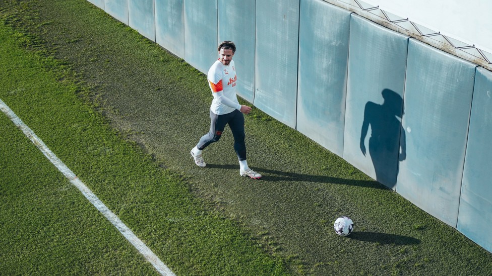 BALL BOY : Jack Grealish collects his ball.