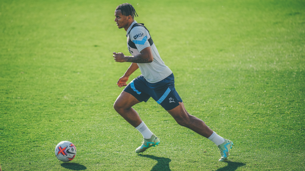 ON THE MOVE : Manuel Akanji sprinting with the ball