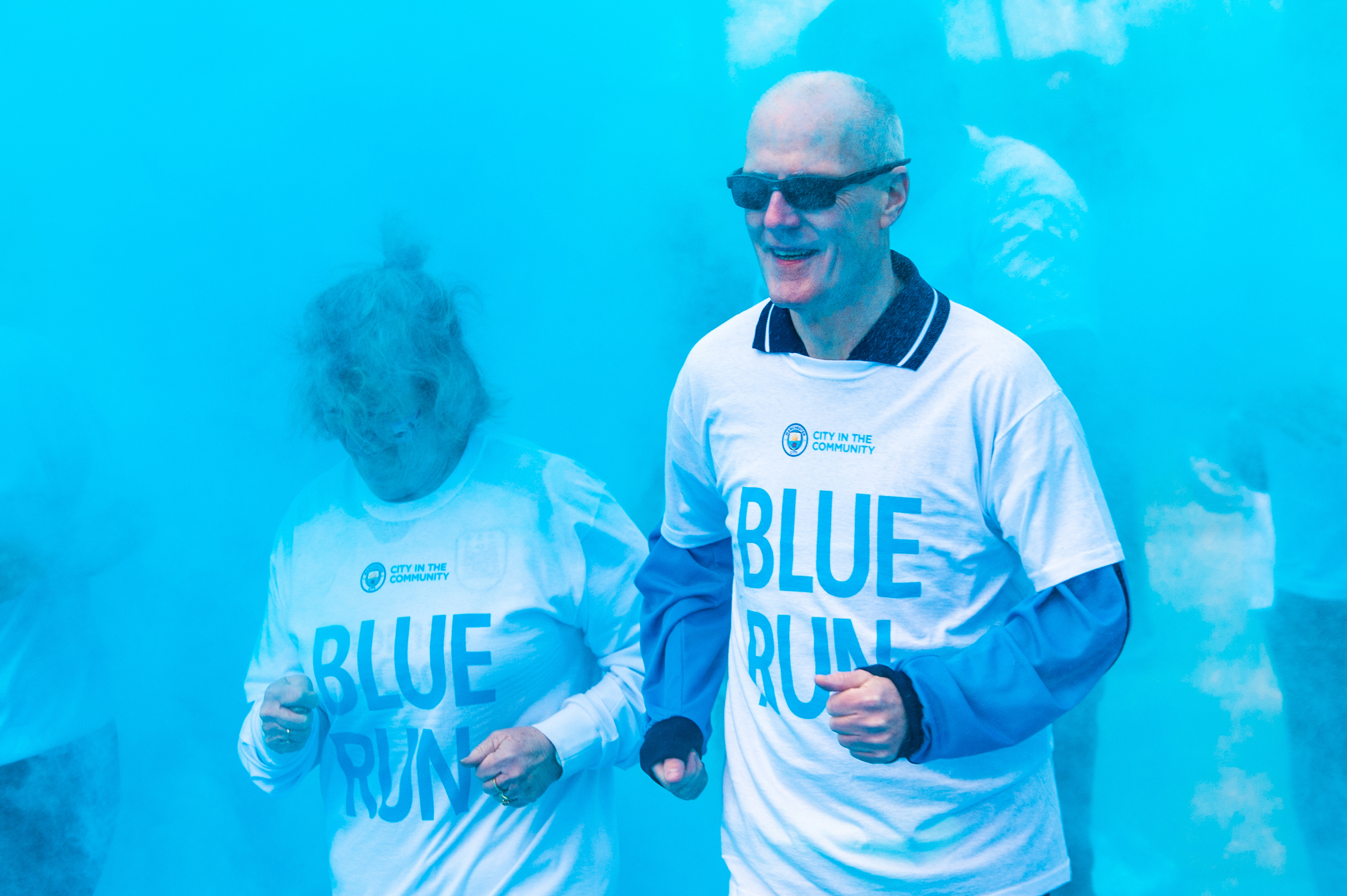 ACTION STATIONS : Runners soak up the special Blue Run atmosphere