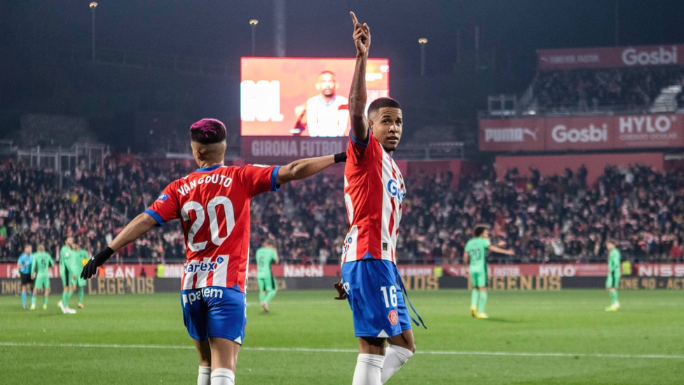 FOR THE FANS : Savinho celebrates with the Girona fans after scoring.