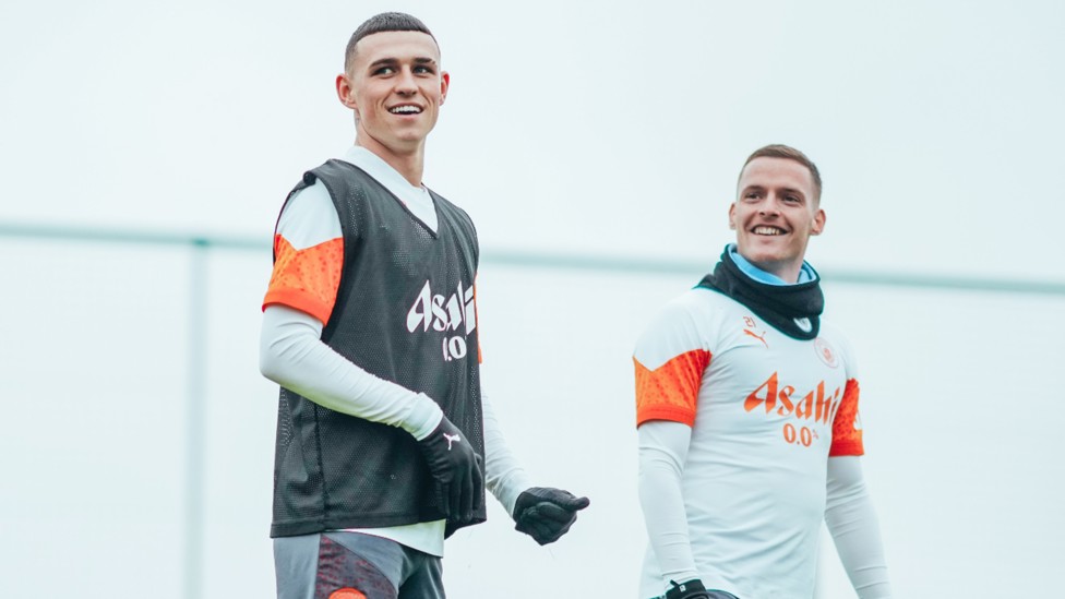 TWO'S COMPANY: Phil Foden and Sergio Gomez's expressions summed up the positive Monday mood!