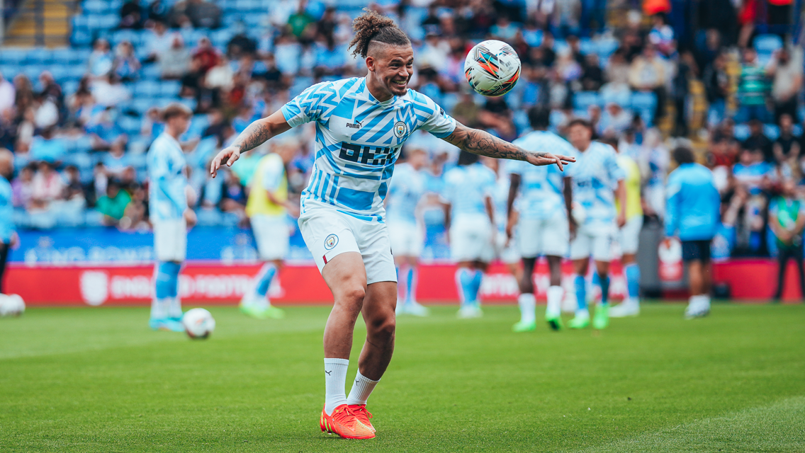 PHIL-ING IT: New signing Phillips gets a touch of the ball during the pre-match warm up.