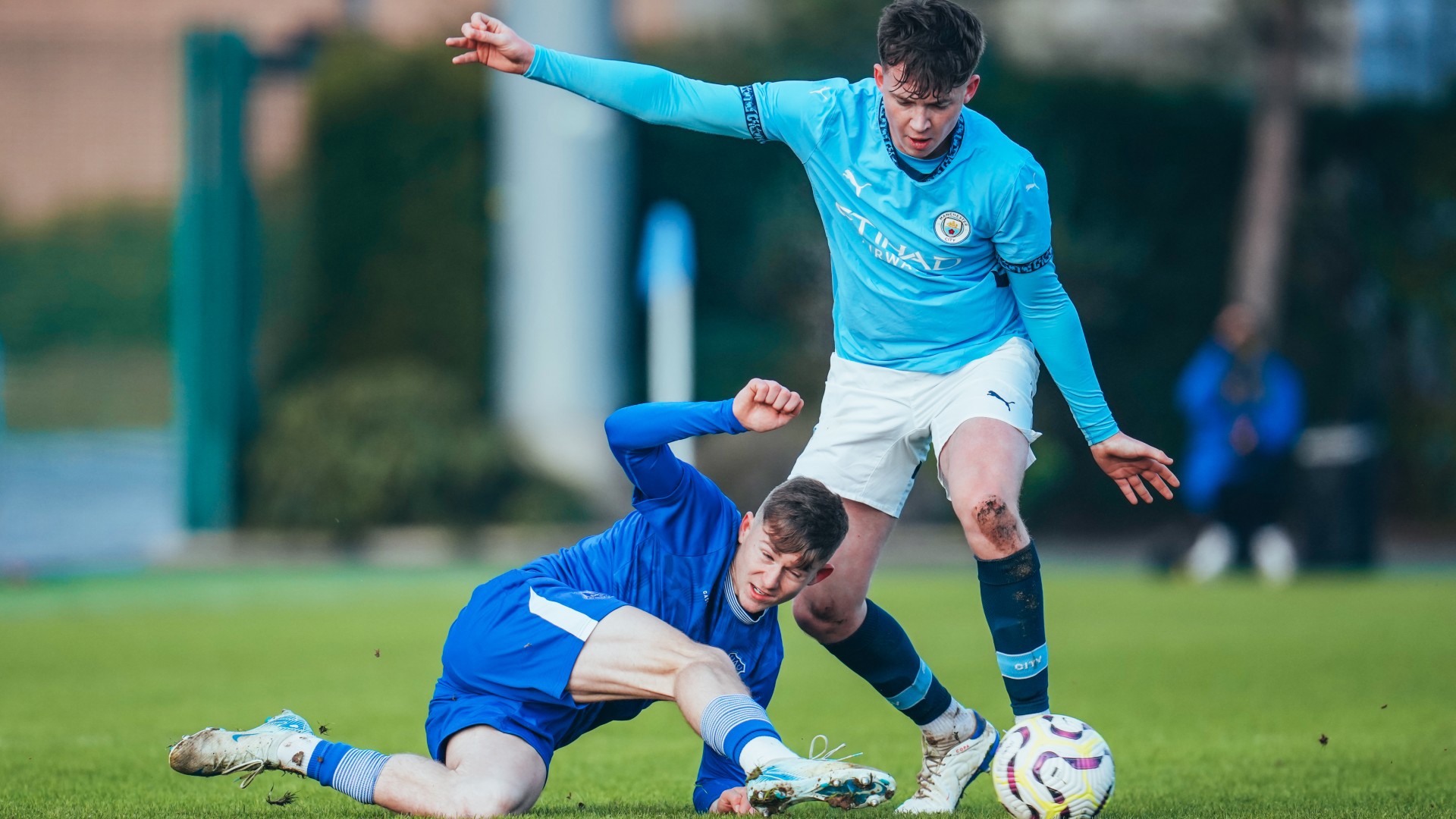 UNDER PRESSURE : Kian Noble shrugs off an Everton tackle.