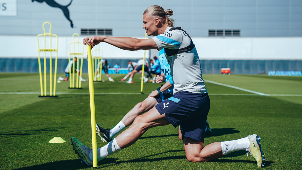 STRETCHING STRIKER : Erling Haaland prepares via our pre-training routine