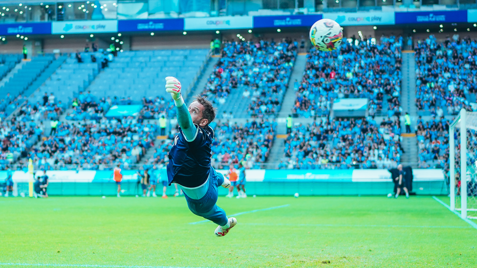 HIGH FLYER: Scott Carson takes to the Seoul skies