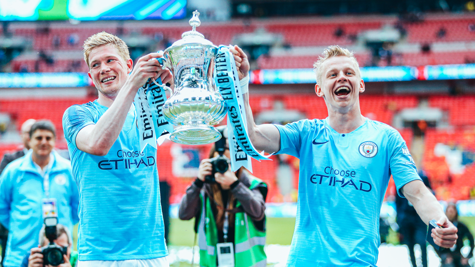 Manchester City's Oleksandr Zinchenko celebrates with the trophy