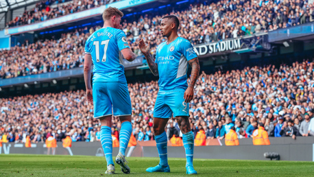 DEADLY DUO: The two scorers celebrate.