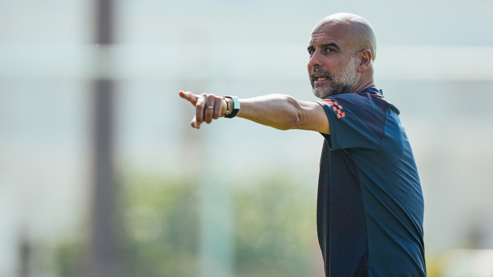 THE BOSS: Pep Guardiola gets his point across to the City players.