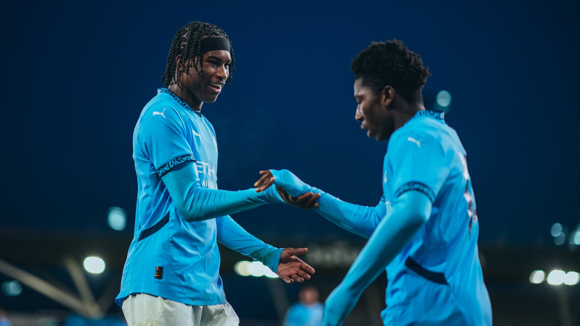  : Reigan Heskey and Ryan McAidoo celebrate the emphatic win. 